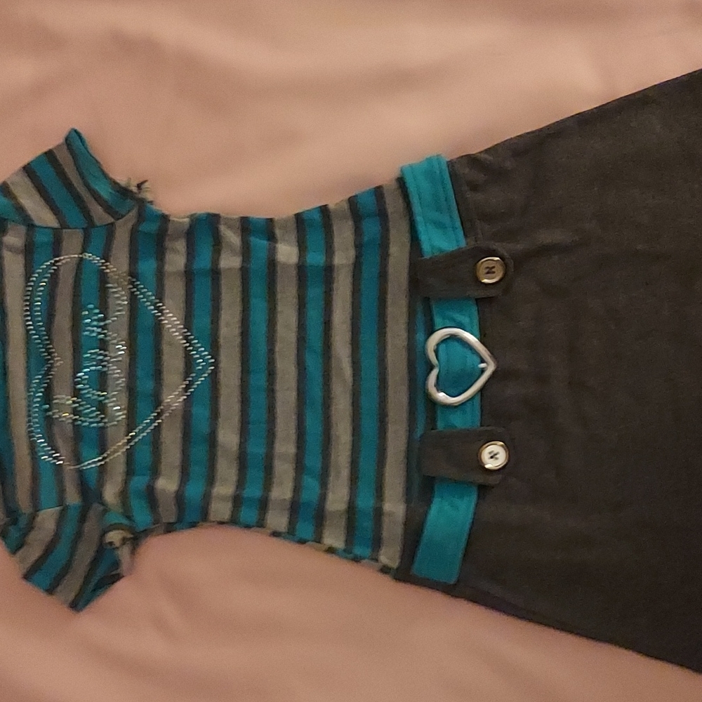 A mini skirt with striped top dress
